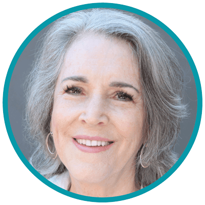 TWH-Olivia-Parr-Rud-Testimonial-Pic Headshot of Olivia Parr-Rud - a white woman with gray hair smiling
