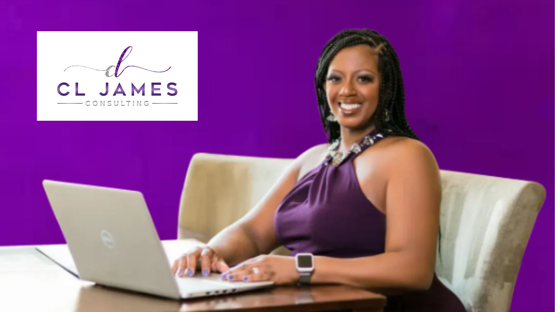 Cheryl James Business Consultant Business consultant Cheryl James sitting at her desk smiling